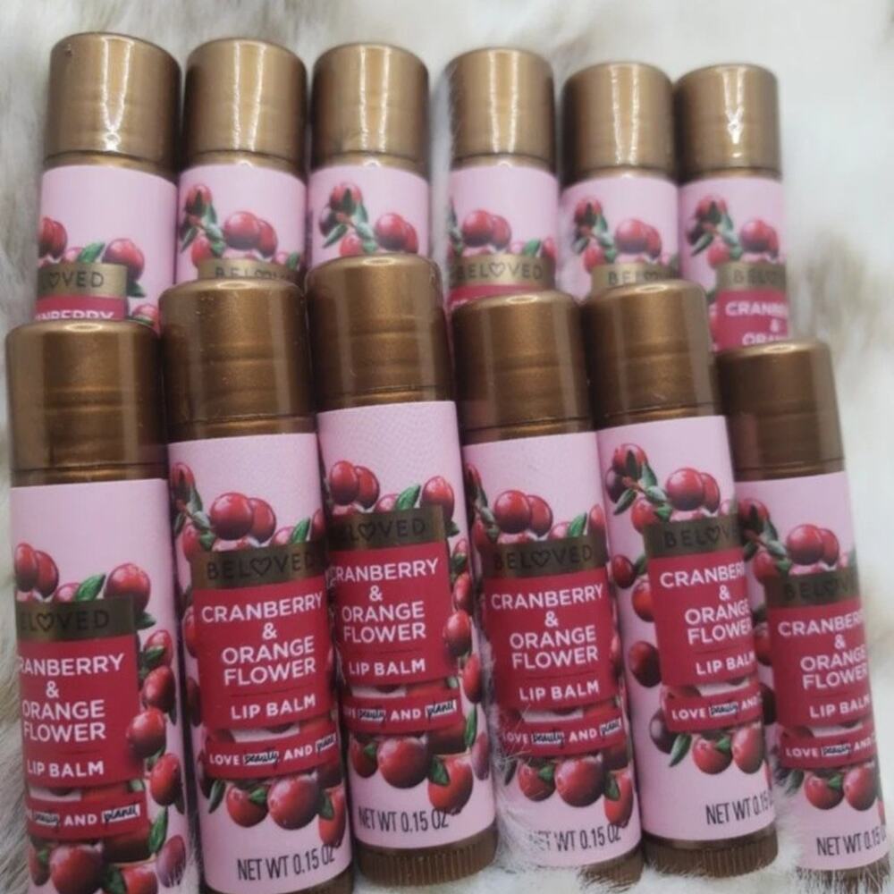 Love, beauty and planet lip balm.  Case of Cranberry and orange flower.